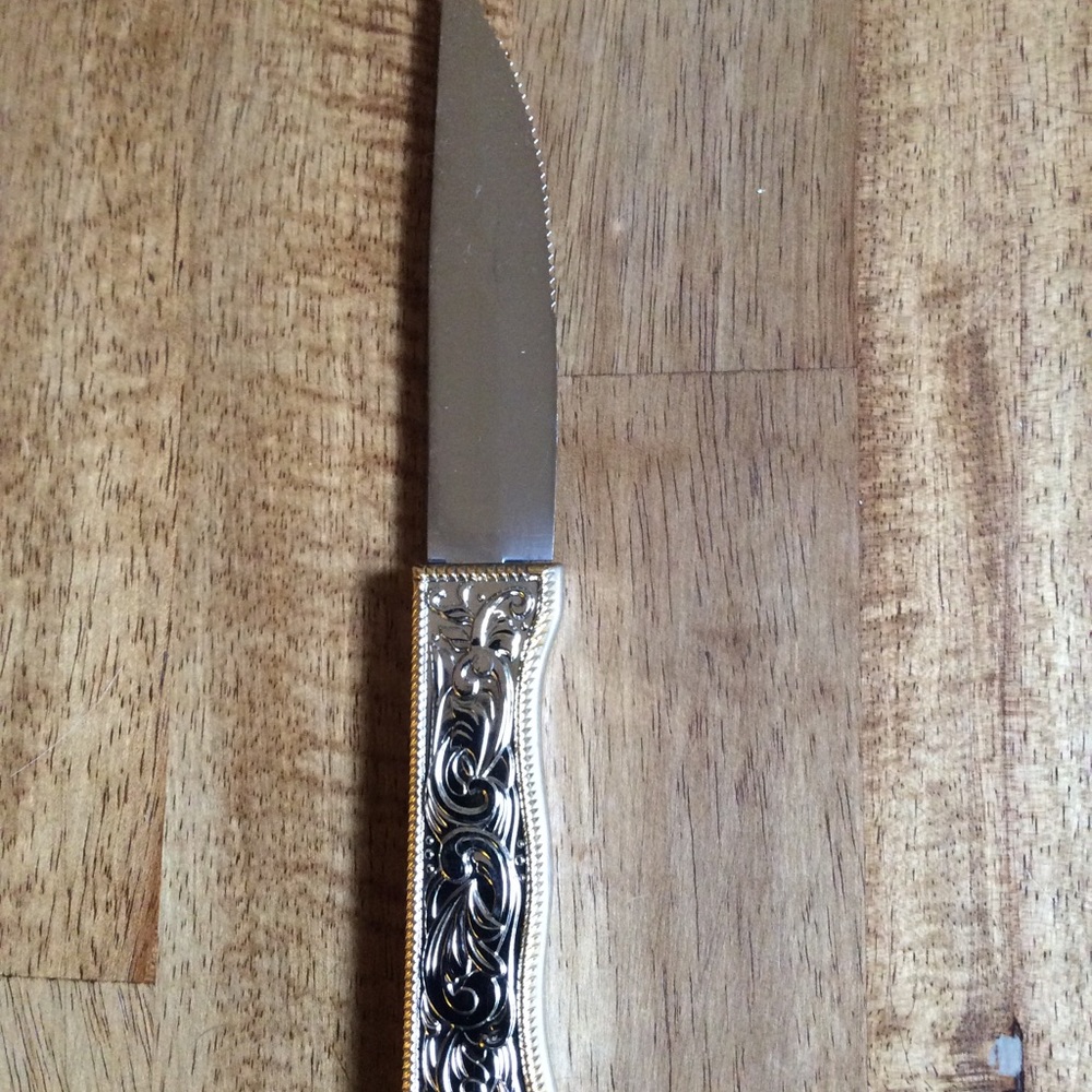 Cowboy Living stainless steal belt buckle knife